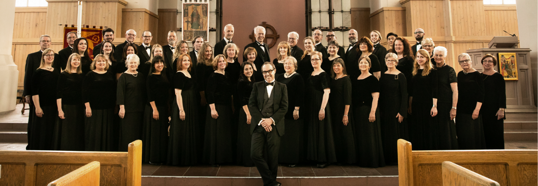 Group photo of Seattle Choral Company Chorus members, smiling.